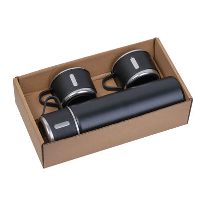 A 3-piece black stainless steel travel mug set inside a brown cardboard box, featuring a large insulated water bottle and three matching mugs with silver accents.