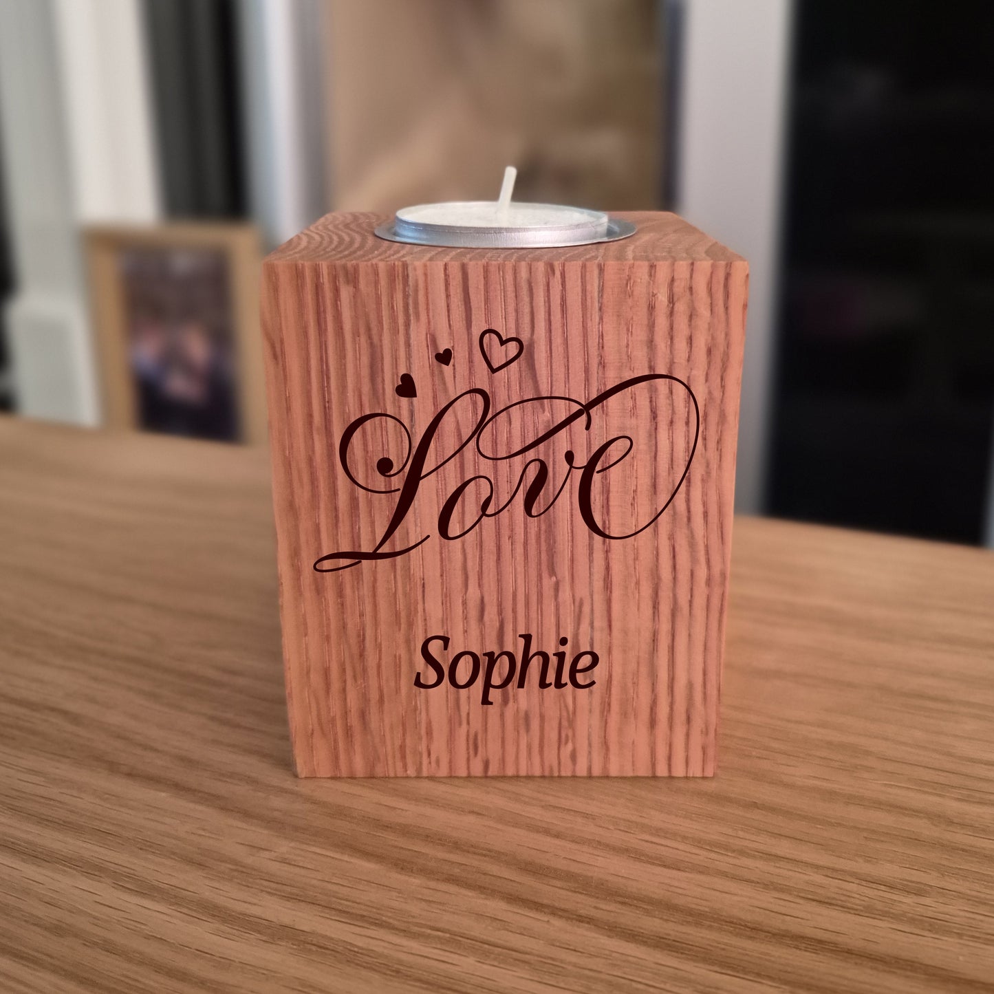Oake tealight holder with 'Love Sophie' engraving on a wooden surface