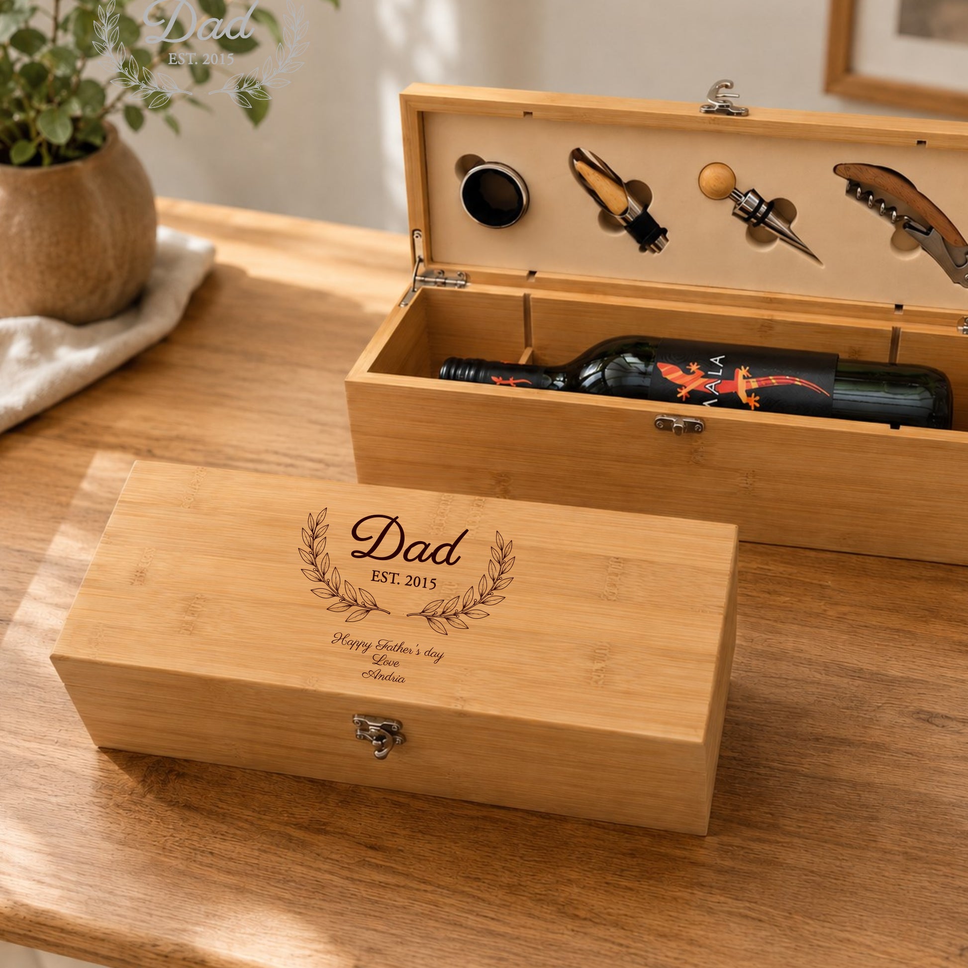 Wine gift box with Dad on the front on a wooden table.