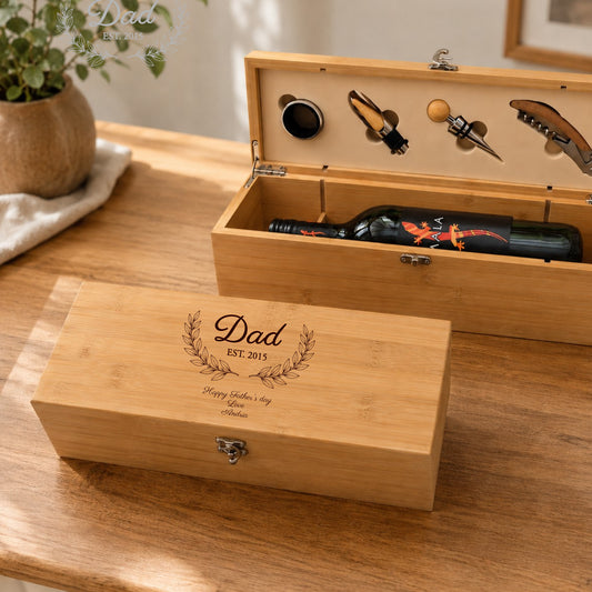 Wine gift box with Dad on the front on a wooden table.