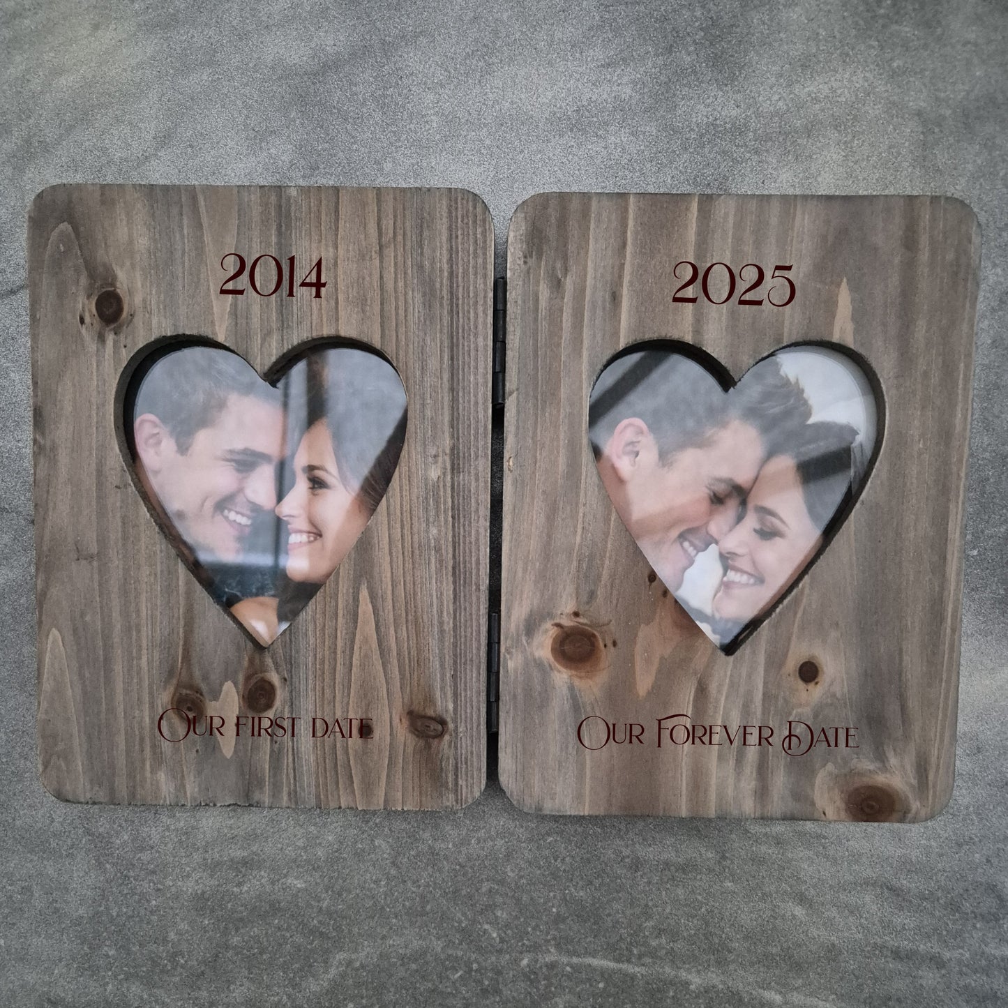 Double photo frame with heart cutouts showing a couple's photos from 2014 and 2025.