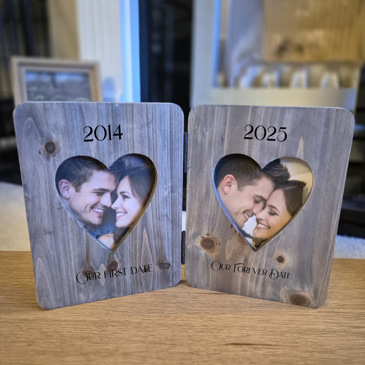 Double phot frame with heart cutouts showing a couple's photos from 2014 and 2025.