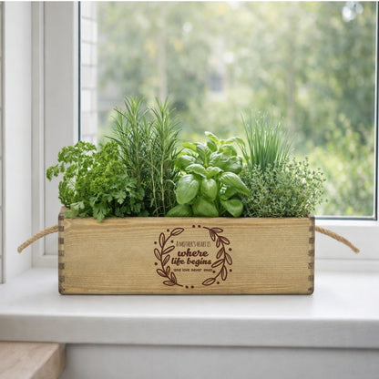 Wooden planter box with herbs on a windowsill