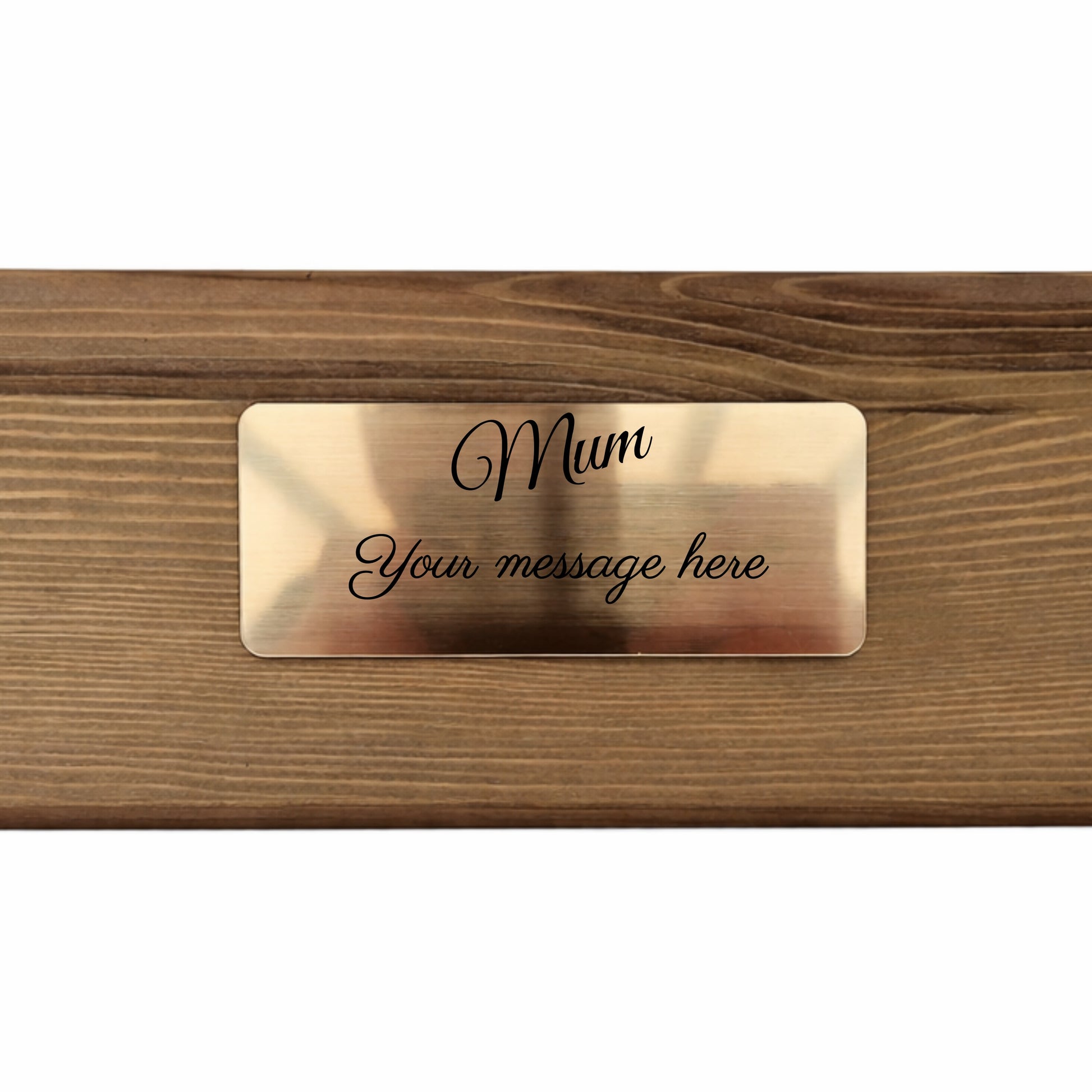 Brass nameplate with 'Mum' engraved on a wooden planter