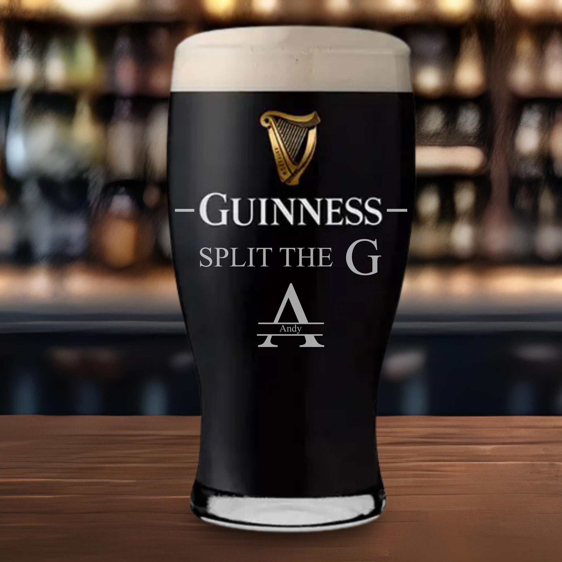 Guinness pint glass with Plit The G engraved to the front along with a monogram of a persons name.