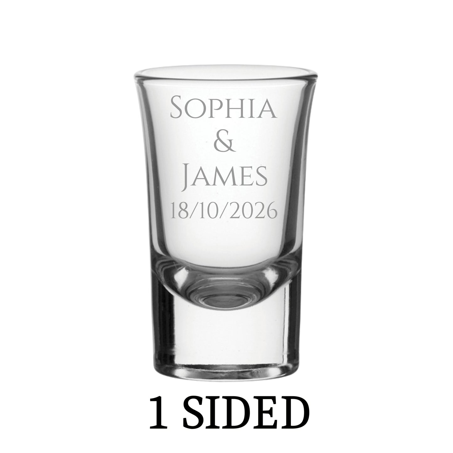 Clear personalised shot glass with engraved text on a white background