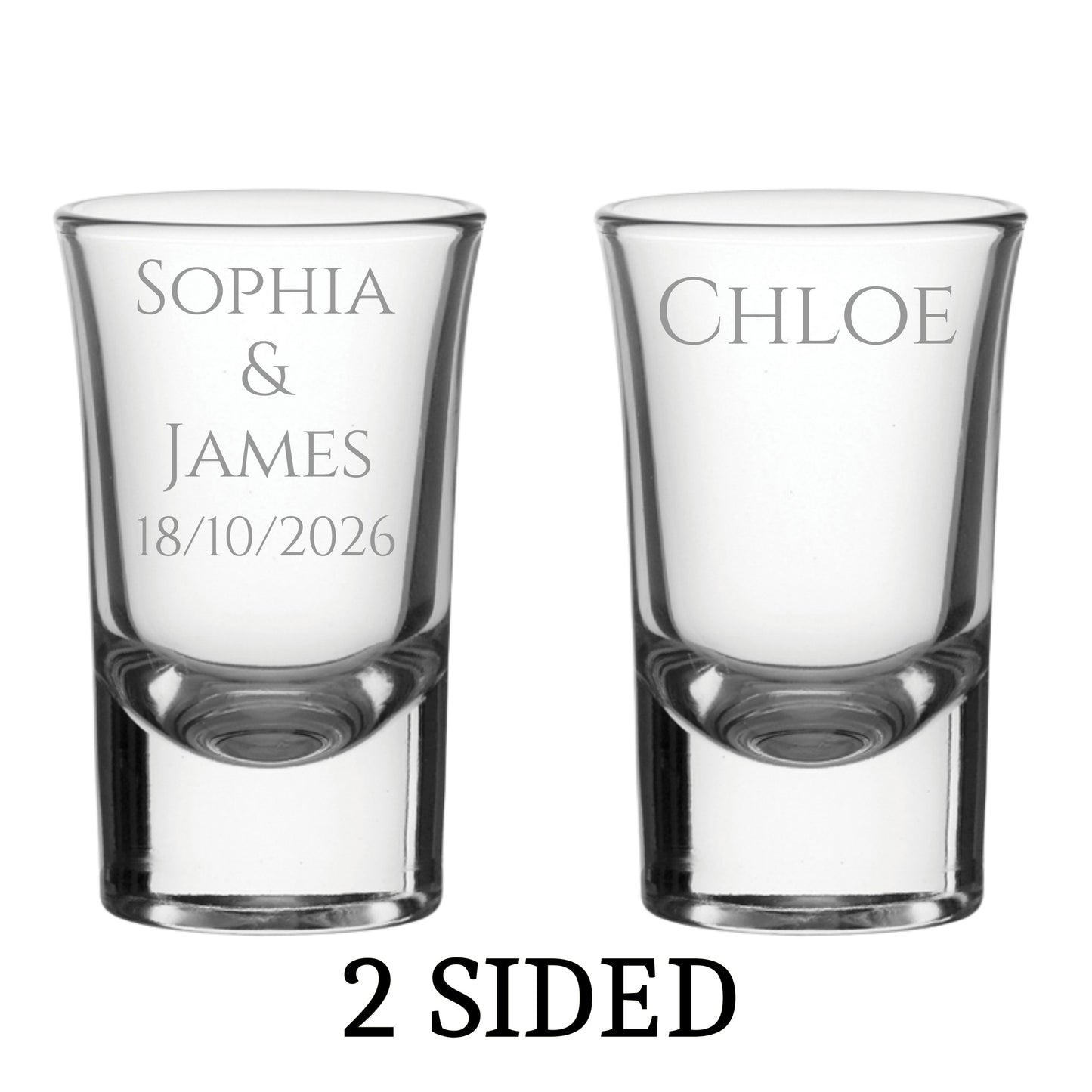 Two clear shot glasses with engraved names and date on a white background