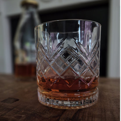 customised whisky glass stood on a table with whisky in the glass