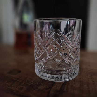 personalised whisky glass empty on a table
