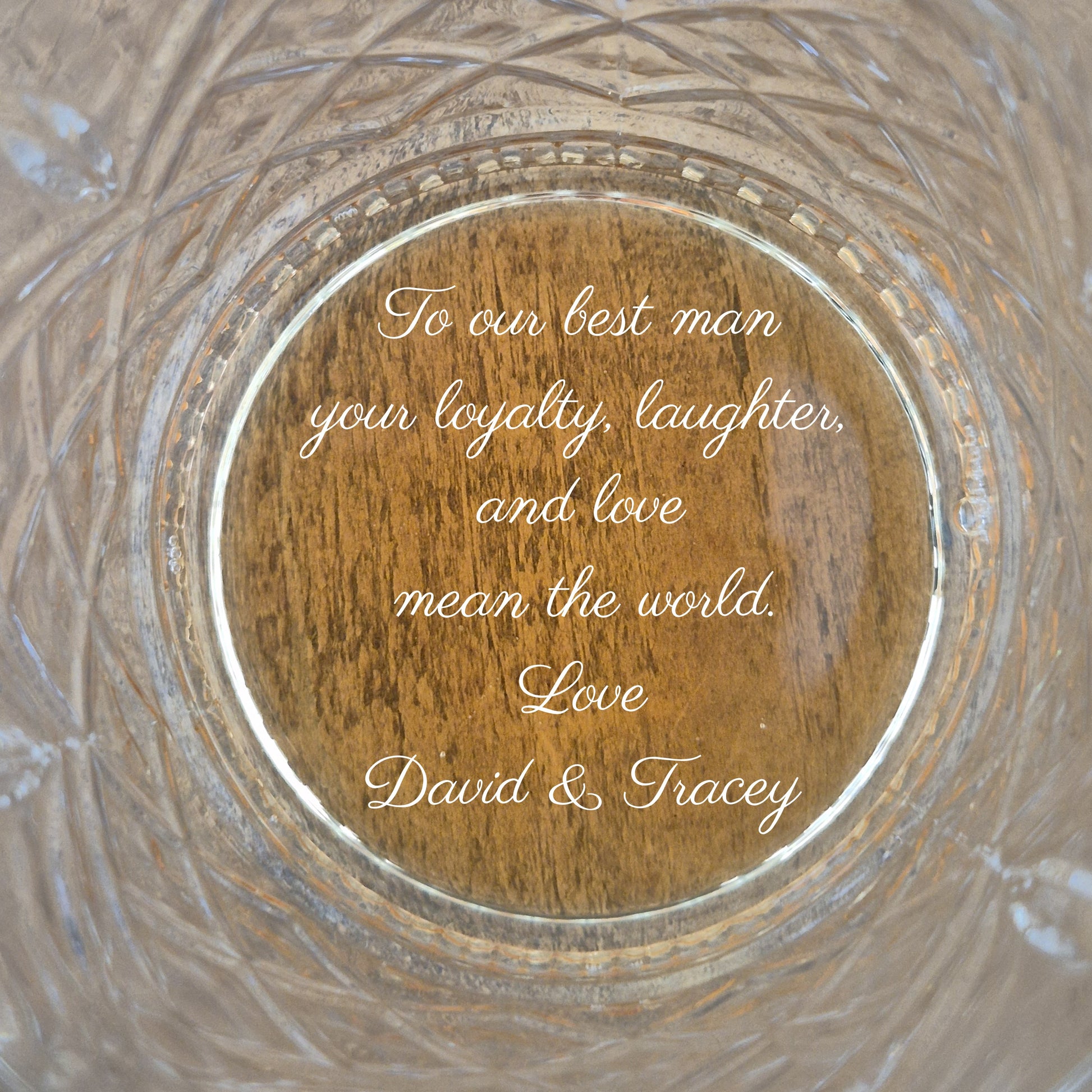 custom whisky glasses showing handwritten message engraved in base of glass