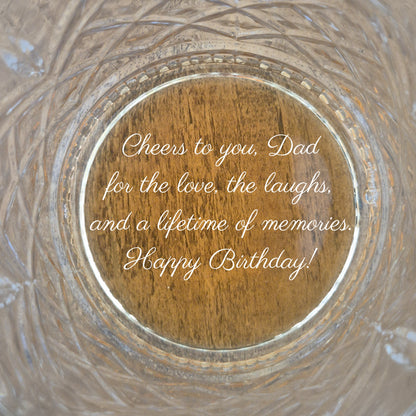 customised whisky glass with an engraved message on the base from a son to his dad.