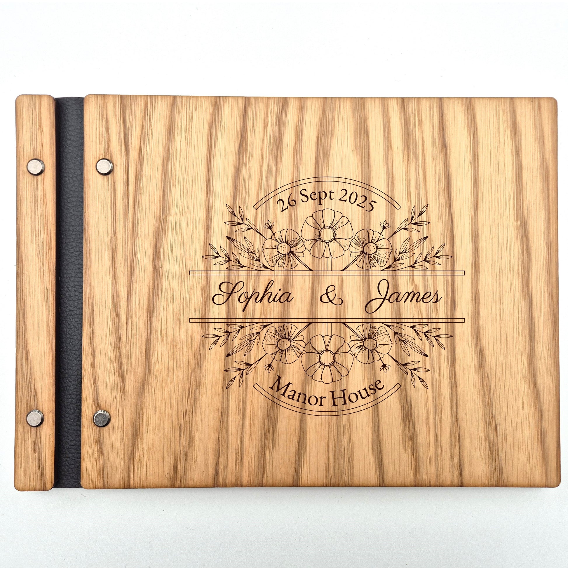 Image of a rustic style oak wedding book. The book is approximately 298mm x 216mm and includes high quality paper. The oak wedding book is laser engraved by laserengraveuk with a floral circular design to the front. The design includes the married couple's names, date of wedding, and the venue.