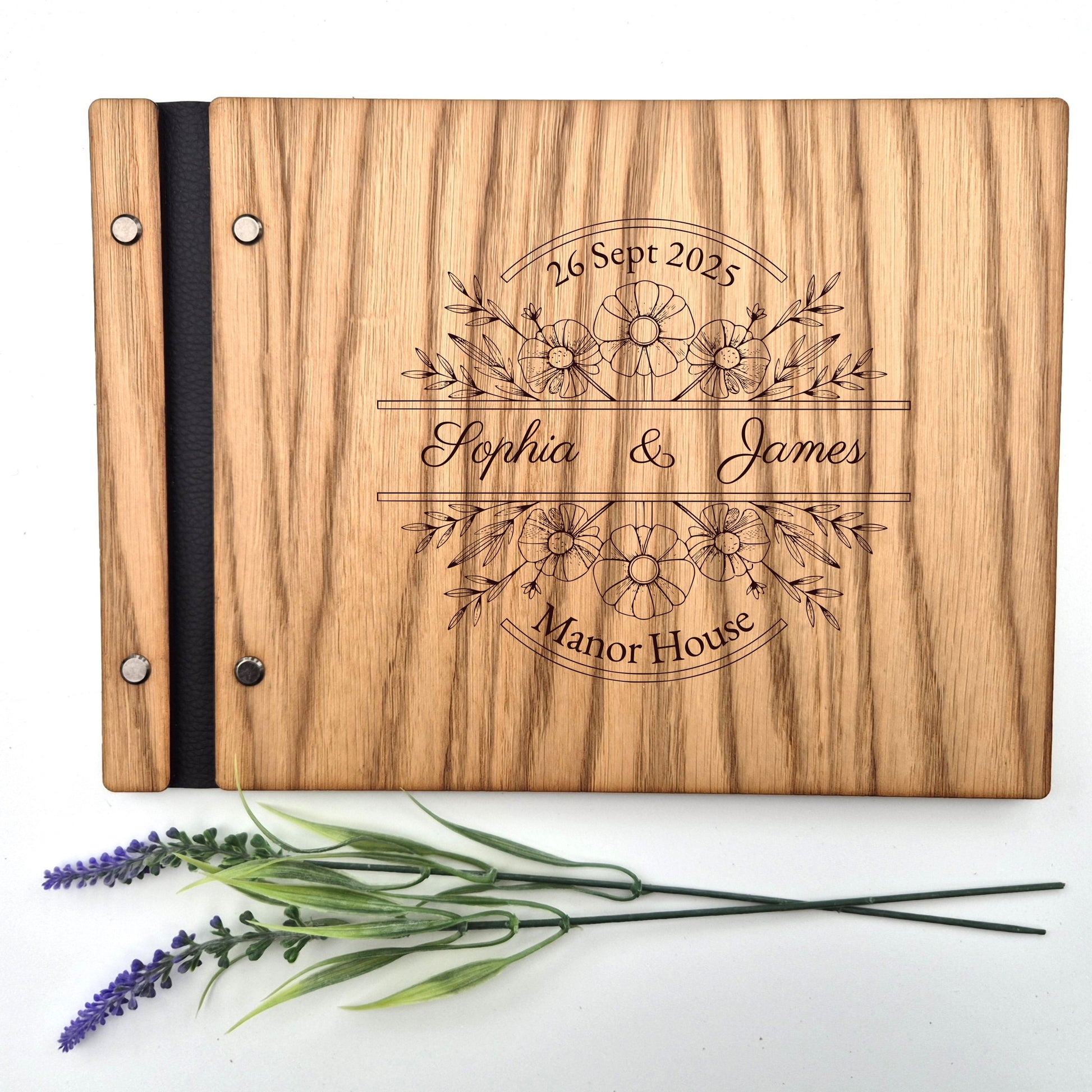 Image of a rustic style oak wedding book. The book is approximately 298mm x 216mm and includes high quality paper. The oak wedding book is laser engraved by laserengraveuk with a floral circular design to the front. The dsign includes the married couples names, date of wedding and the venue.