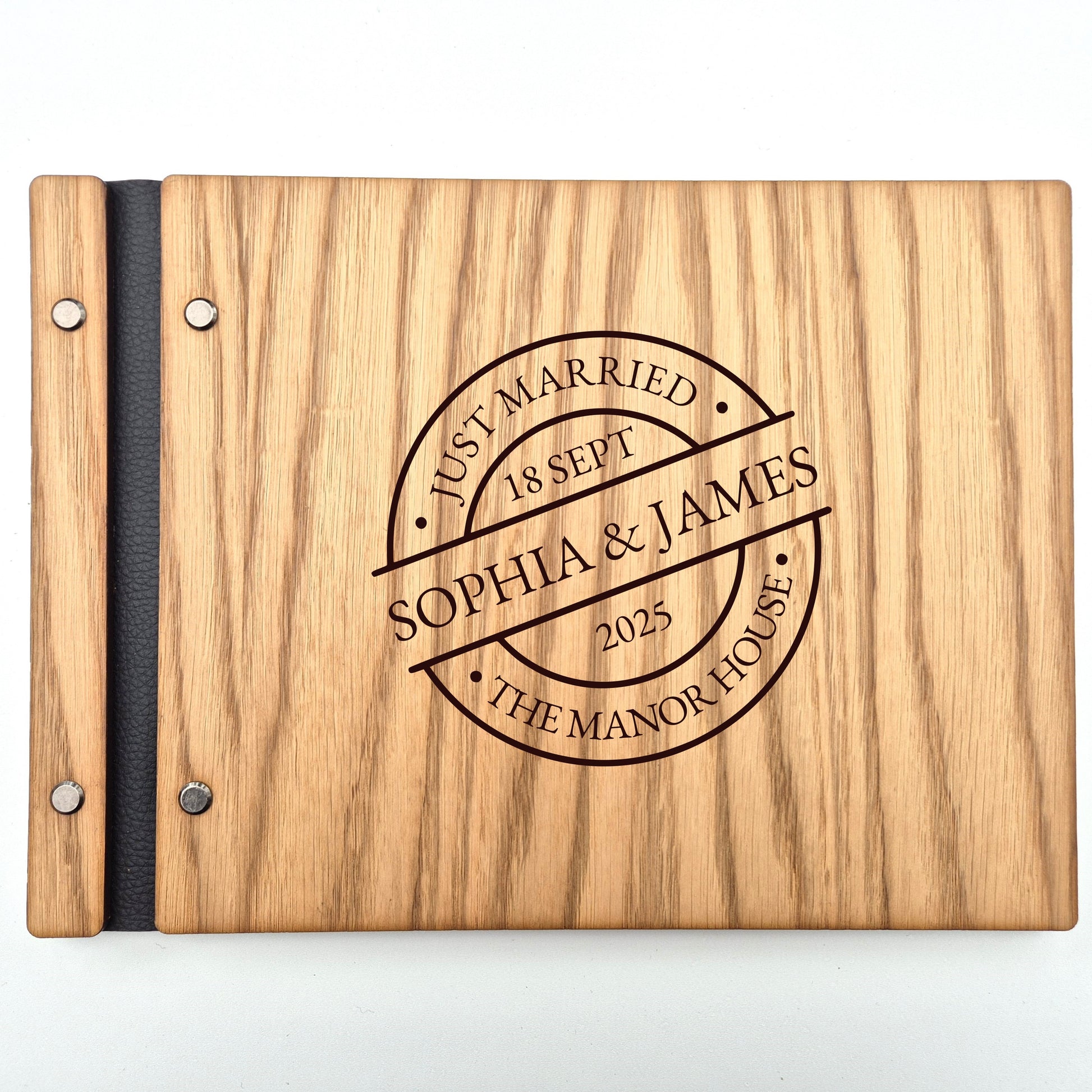 Image of a rustic style oak wedding book. The book is approximately 298mm x 216mm and includes high quality paper. The oak wedding book is laser engraved by laserengraveuk with a circular just married stamp design to the front. The design includes the married couple's names, date of wedding, and the venue.