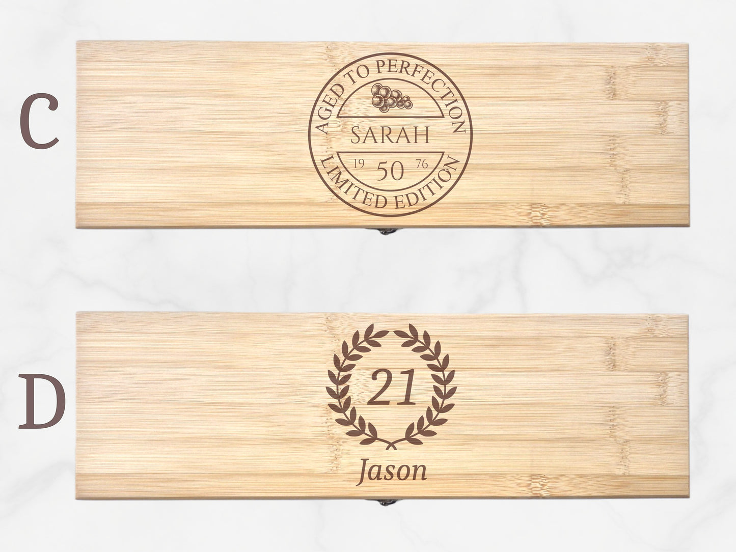 Two wooden boxes with engraved text and designs on a white background