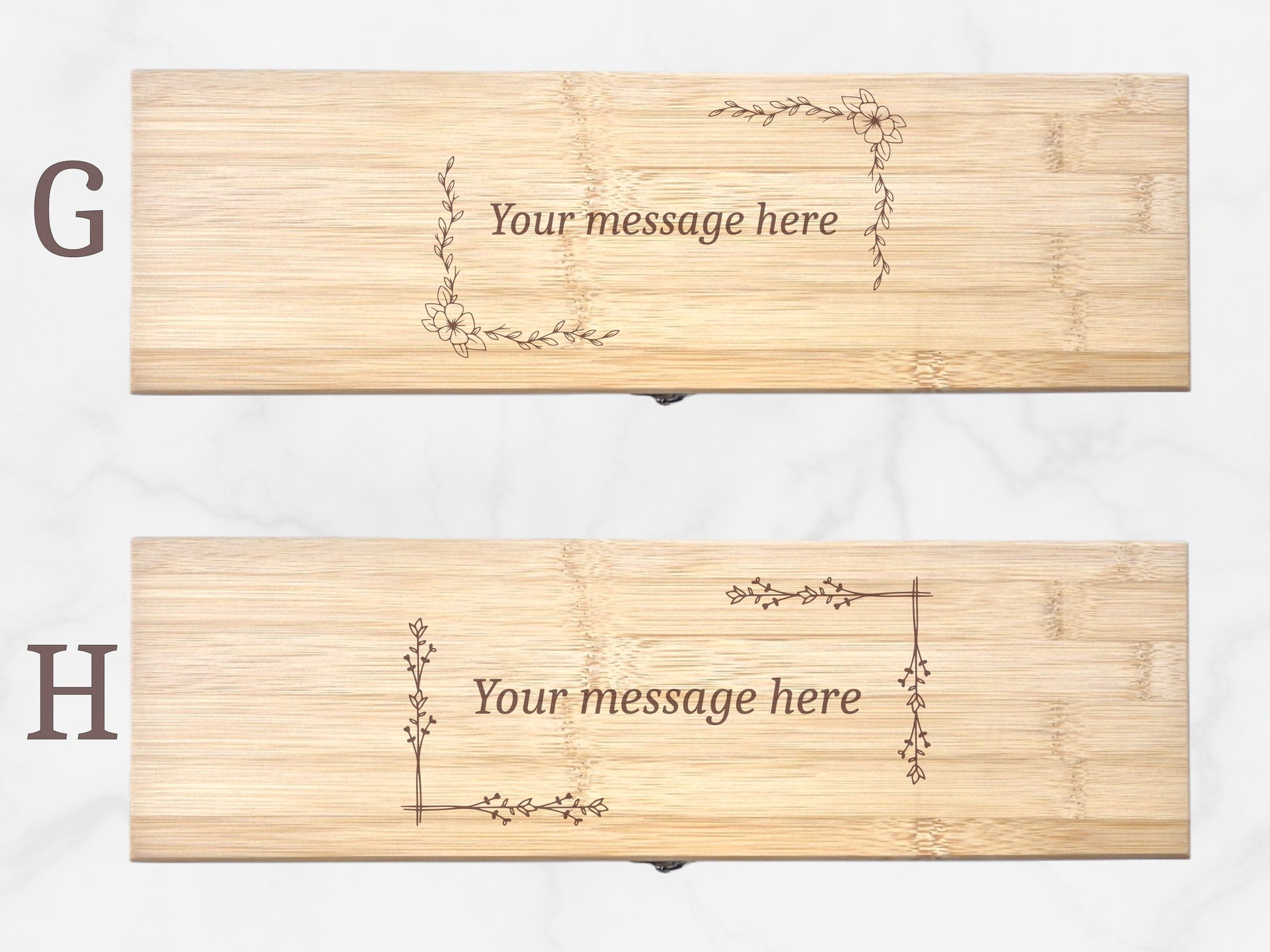 Two wooden nameplates with engraved decorative designs and 'Your message here' text on a white background.
