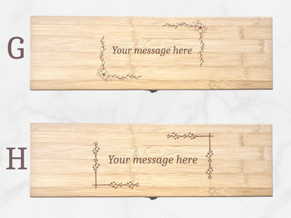 Two wooden nameplates with engraved decorative designs and 'Your message here' text on a white background.