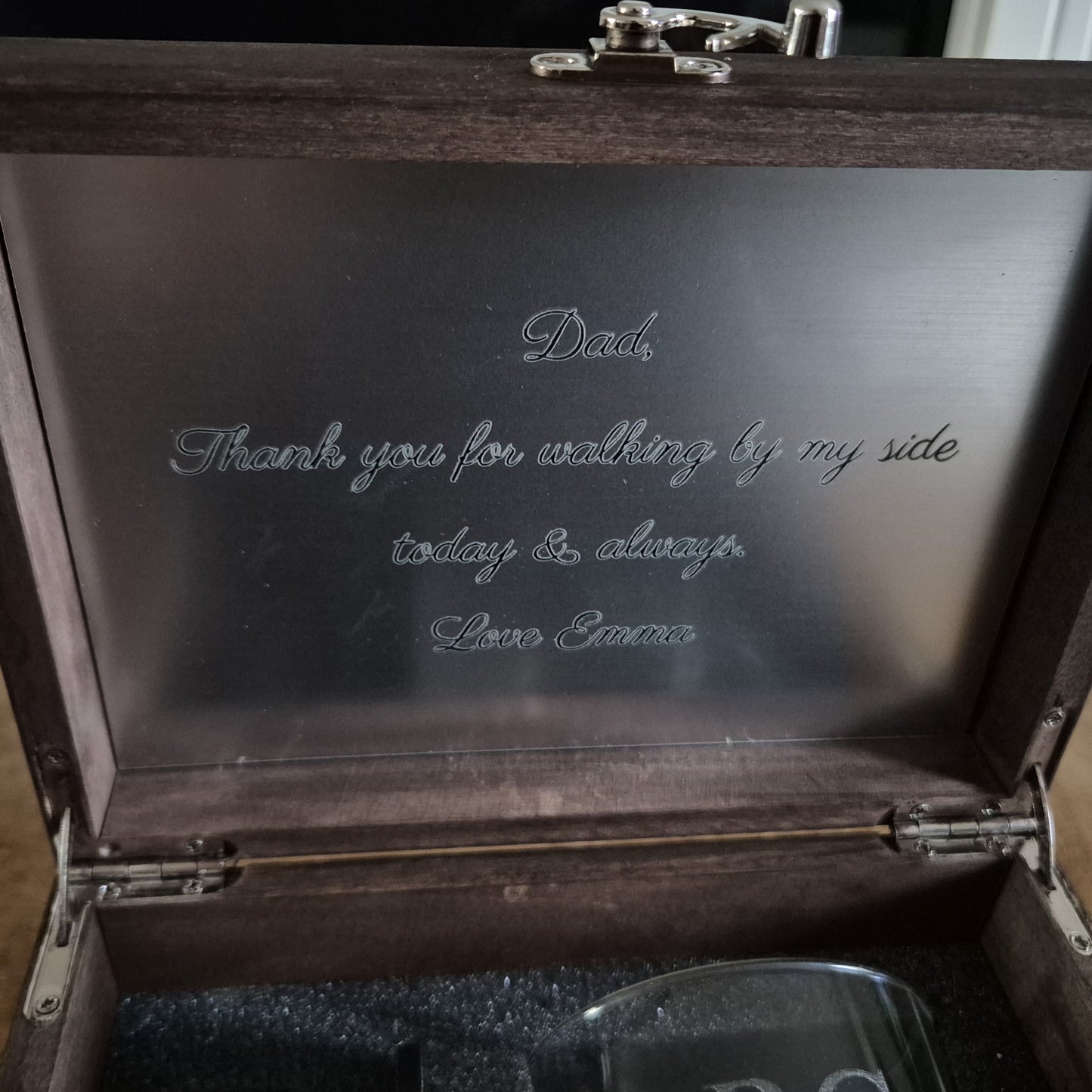 Wooden whisky box with engraved text containing an engraved whiskey glass, stones and oak coaster.