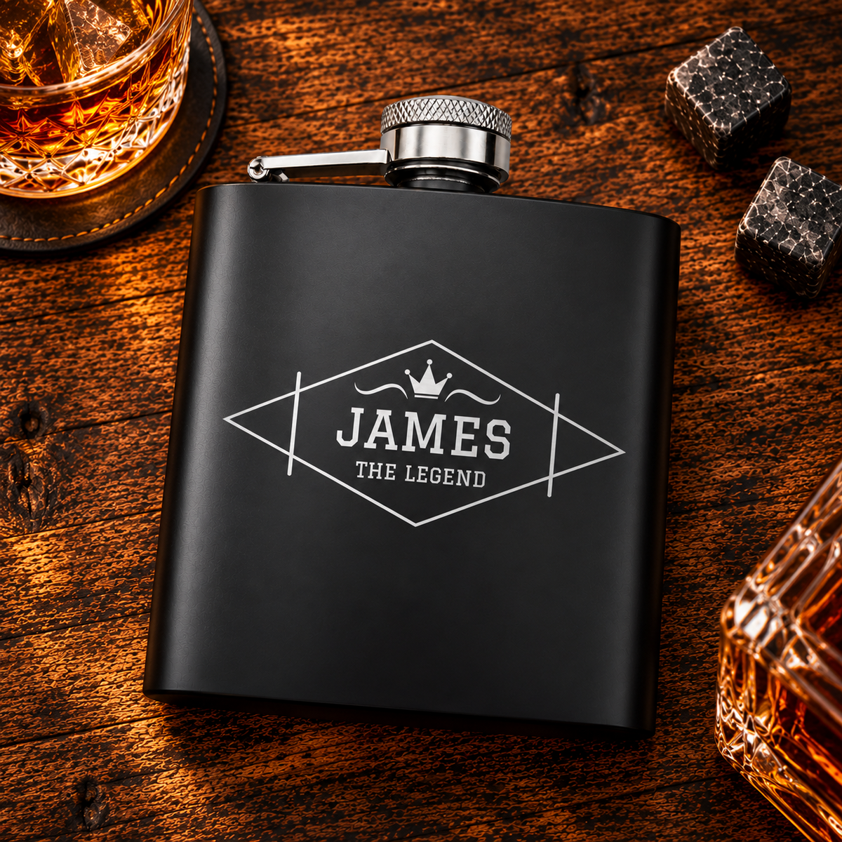Black hip flask with James The Legend engraving and crown design